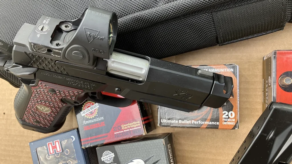 The compensated barrel is a stacked dual-port design that fits seamlessly at the end of the slide.