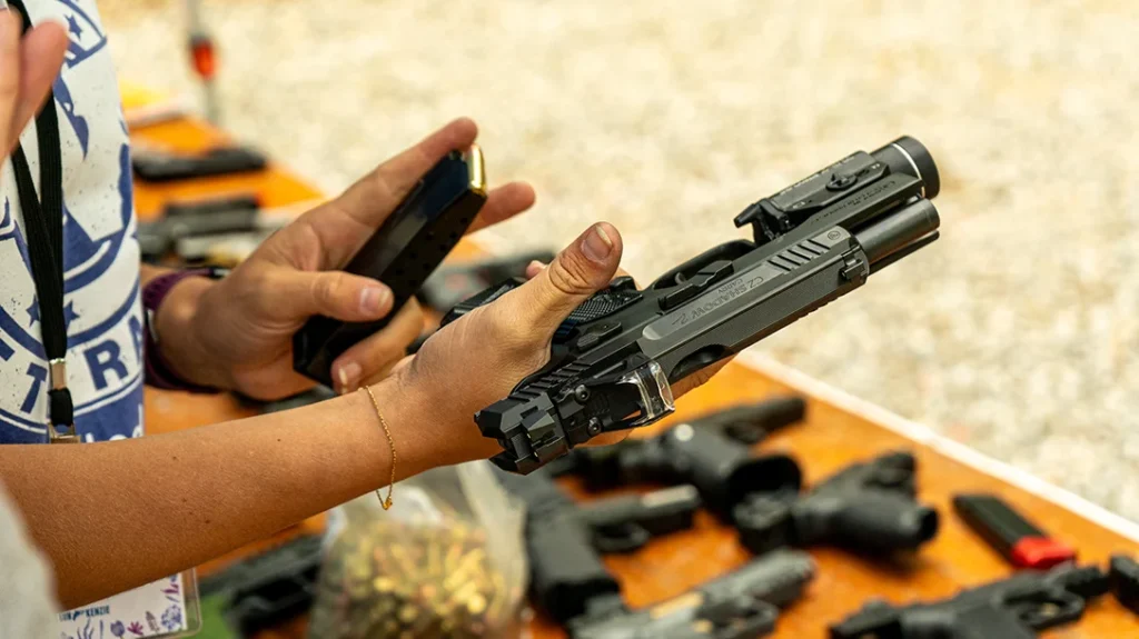 The author recommends finding the largest gun, with the most capacity, that you can carry concealed on your body.