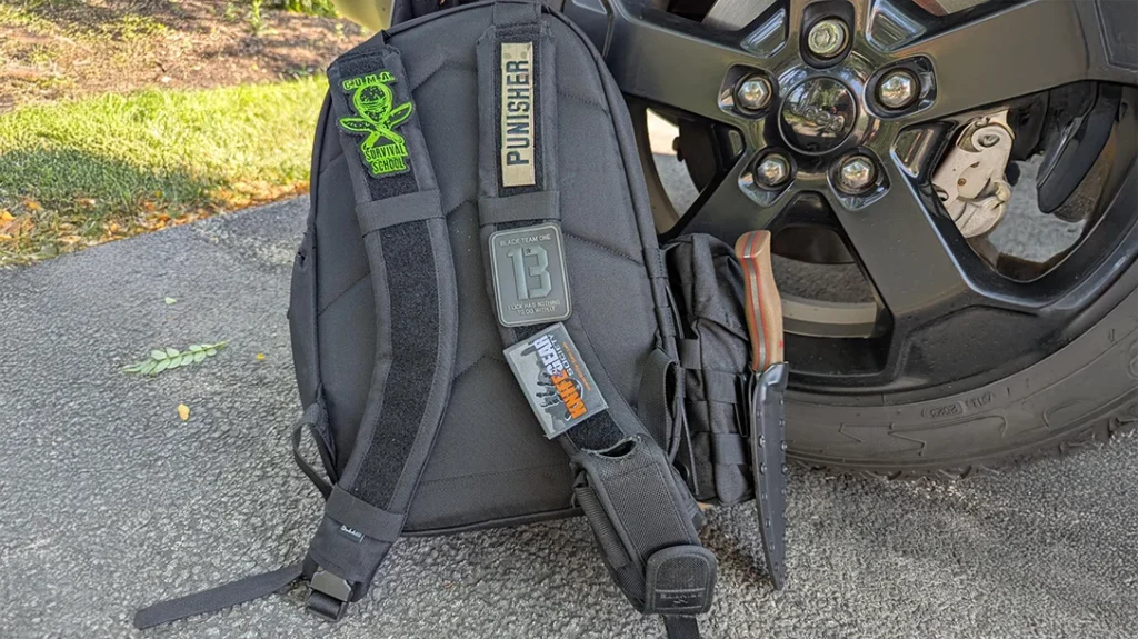 The sheath comes with fastener clips. They make it easy to make throw the knife onto a belt, or onto a gear pack with MOLLE webbing and go.