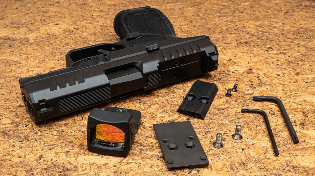 The Rost Martin RM1S uses the XD/XDM sight footprint, so they should be very easy to find.