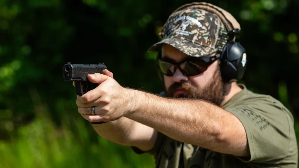 The grip frame provides a very generous relief cut behind the trigger guard.