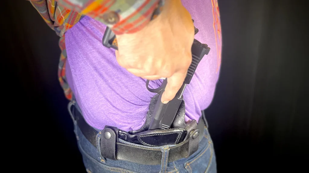 A properly adjusted holster should let you establish a full firing grip while keeping the gun comfortably tucked away when not in use.