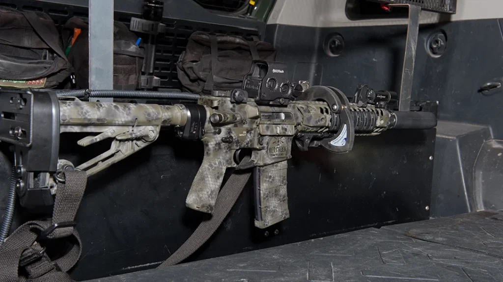 A solution for your rifle would be an electric lock designed for a cage or rack.